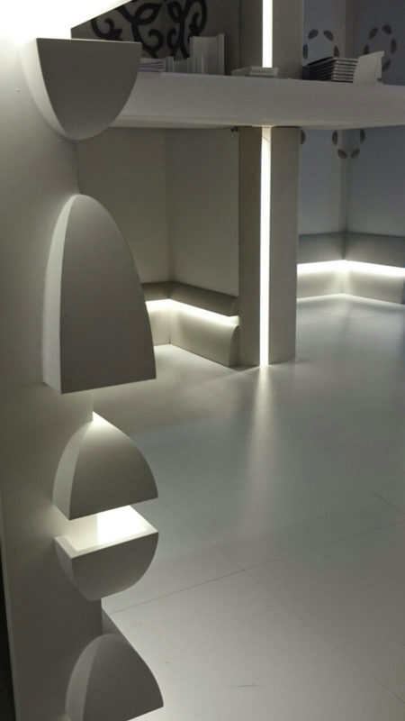 multifunctional molding profile shown installed in variety of ways with LED lighting, providing a subtle