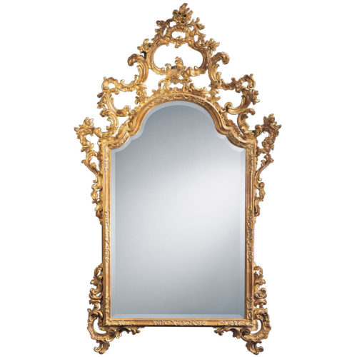 This elegant carved wood mirror is hand crafted in 18th century Italian style. Decorative wall mirror has floral design with graceful scrolls. This mirror is hand-crafted in Italy