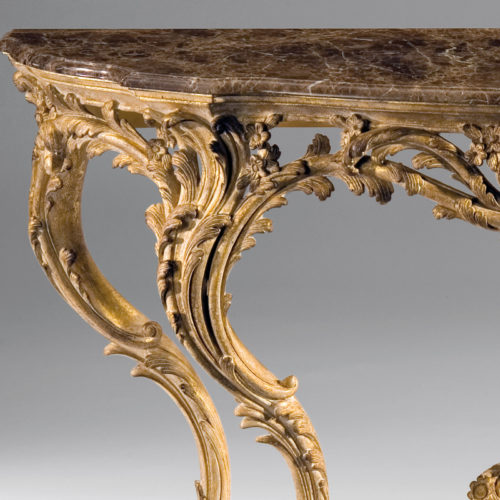 Carved wood console table with shell motif in distressed gold leaf decape finish. Louis XV console has brown Emperador marble top. This console table is hand made in Italy