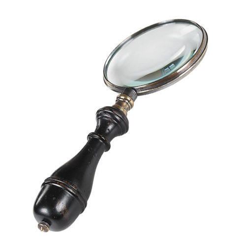 Classic accessory for any coffee table or end table this magnifier is perfect for proverbial fine print and thumbnail-sized road maps.