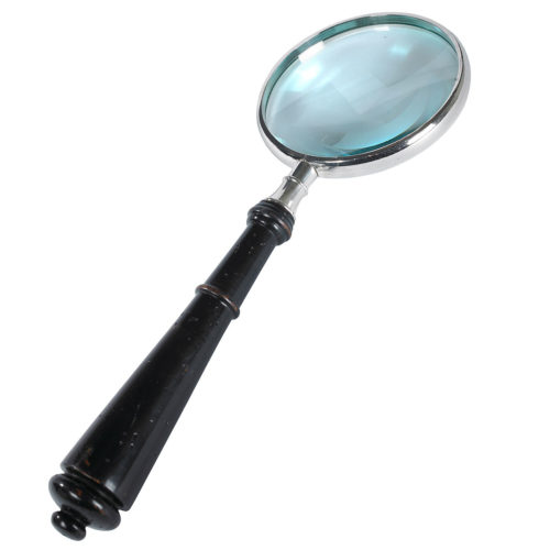 Classic accessory for any coffee table or end table this magnifying glass is perfect for proverbial fine print and thumbnail-sized road maps.