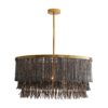 The layered concentric construction is crafted from wood and coconut beads that are strung along an antique brass frame, showcasing a melange of smoky hues. Coconut shell talons hang from the wood bead strands. Though light and airy, this 3-light chandelier establishes a strong natural presence in any setting.