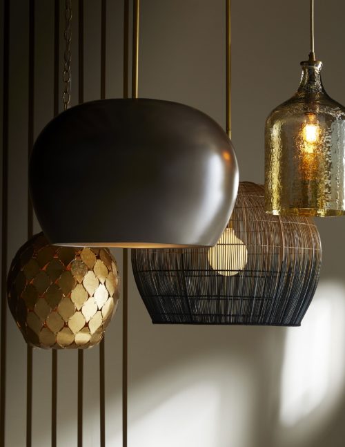 Group of modern pendant lights in various finishes.