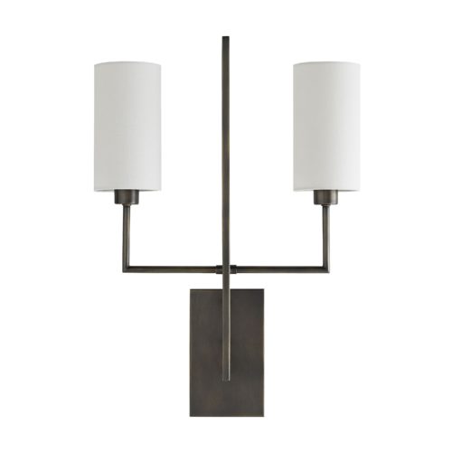 Reach out your arms and grab the glory, this sconce stretches wide with two steel dowels supporting cylindrical white linen shades. The dowels are supported off an elegant central steel blade. The scale of this fixtureprovides architectural interest while amplifying the light in any entry hall, corridor or room. Finished in aged bronze.