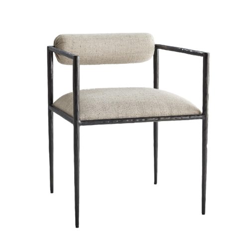 This exquisite frame is perfectly poised, perched on delicate legs that are as faint as insects'. The natural iron body has been hand-forged, yielding soft impressions along the sharp-angled frame. The tight seat and bolster back cushion are coveredin a textured pewter poly-blend fabric.